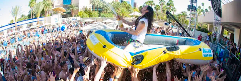 alt="Travel Tips for Extrovert Travelers - a pool party in Las Vegas, Nevada."