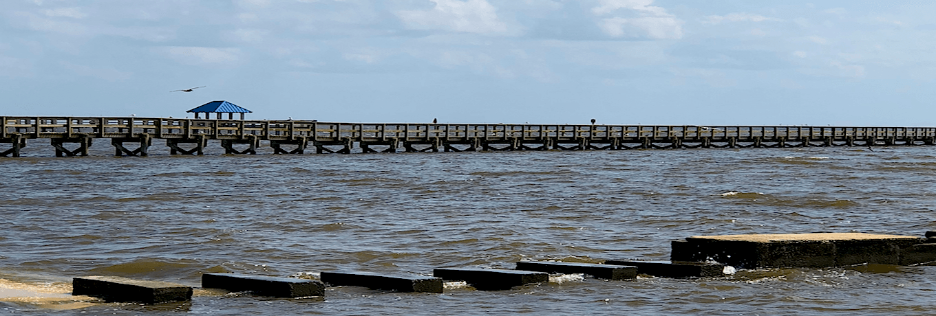 alt="Oceanalt=" A new vacation inspiration slow travel to Gulf of Mexico visiting Ocean Springs, Mississippi."